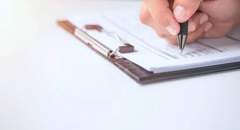 Image of someone filling out a survey